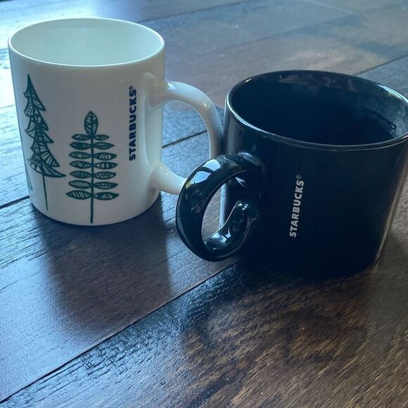 Set of two Starbucks mugs 12 ounces 2017 black mug and 2015 pine tree cream colo - Picture 1 of 4